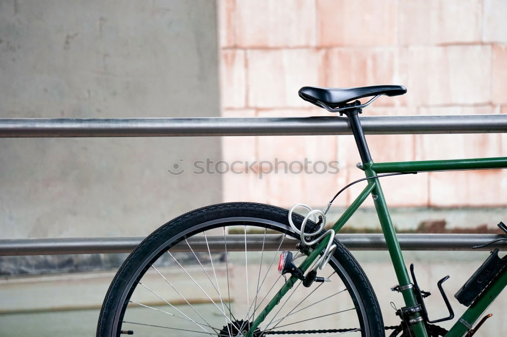 Similar – Road bicycle against brick wall