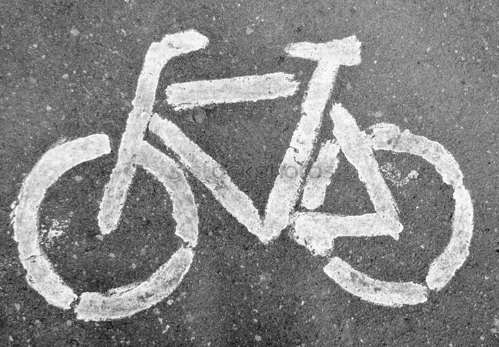 Similar – A joker has painted a stick figure with red paint on a white bicycle