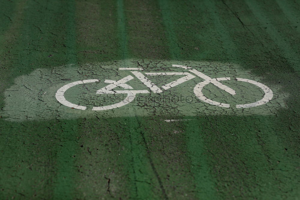 Similar – Cyclists on the road Green