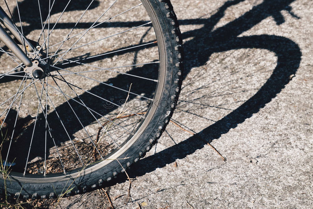 Similar – huge dent in the wheel (rim, spokes with the tire)