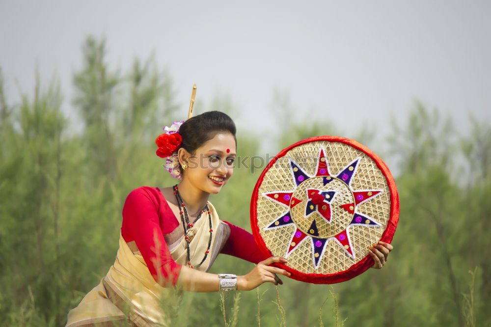 Similar – Woman fanning herself.