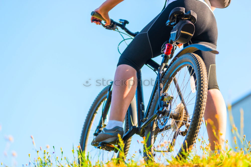 Similar – Image, Stock Photo Naughty boy with defiant gesture over bike on a cycleway