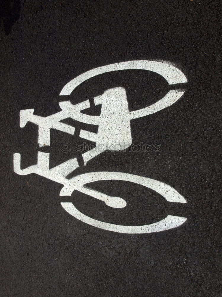 Similar – richtungsweisend | Straßenmarkierung Moped-Parkplatz