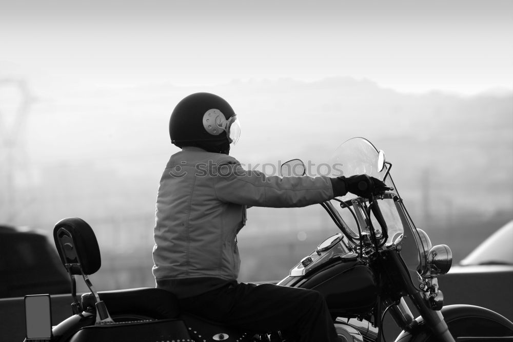 Similar – Image, Stock Photo Man with motorcycle in snowy road