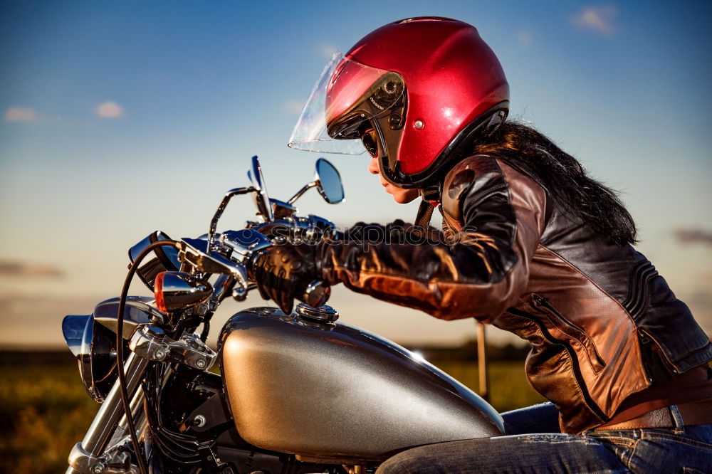 Similar – Man riding custom motorbike