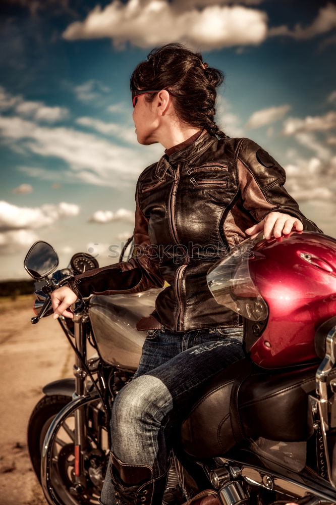 Similar – Man standing near motorcycle