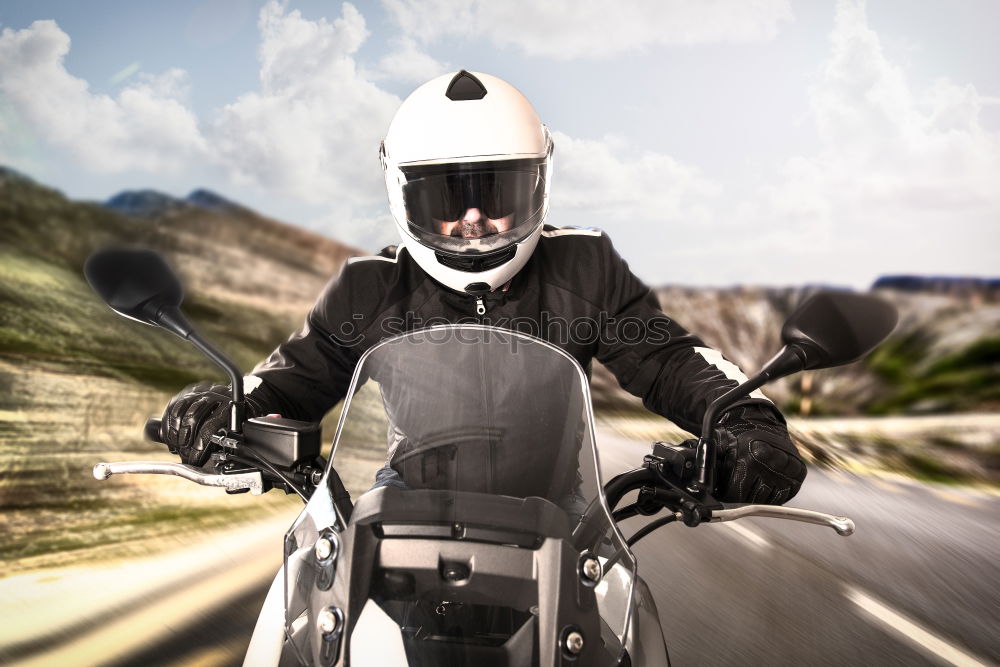 Similar – Man on bike looking away