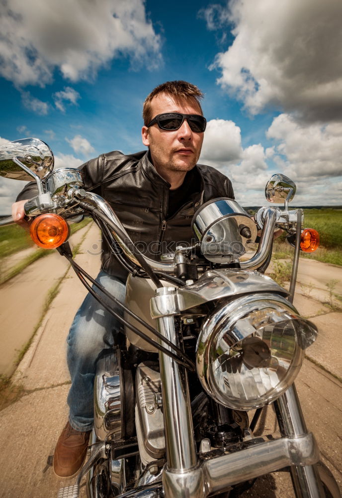 Similar – Image, Stock Photo Biker taking motorbike to the garage