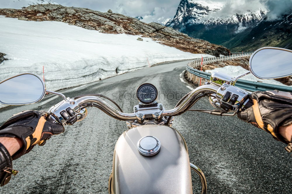 Similar – Image, Stock Photo Man with motorcycle in snowy road