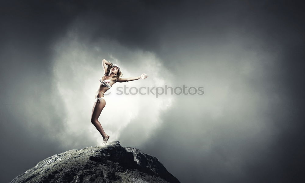 Similar – Image, Stock Photo on the rocks Sports Yoga