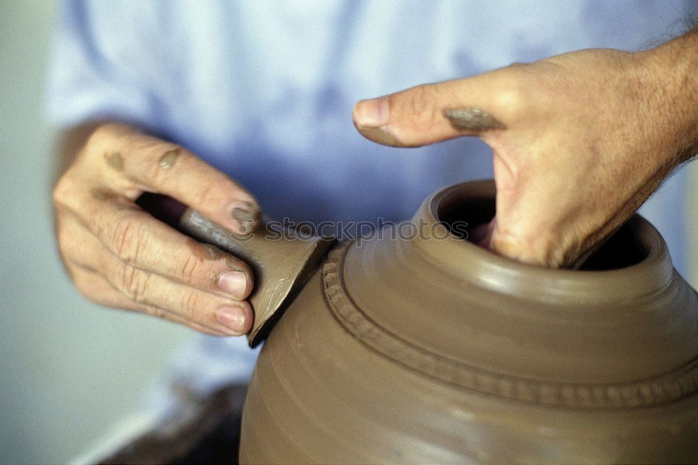 Image, Stock Photo Close-up of clay vase on wheel