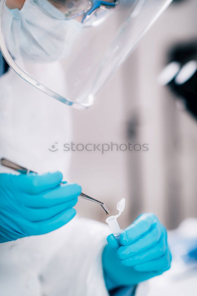 Image, Stock Photo Hands holding plastic test tube