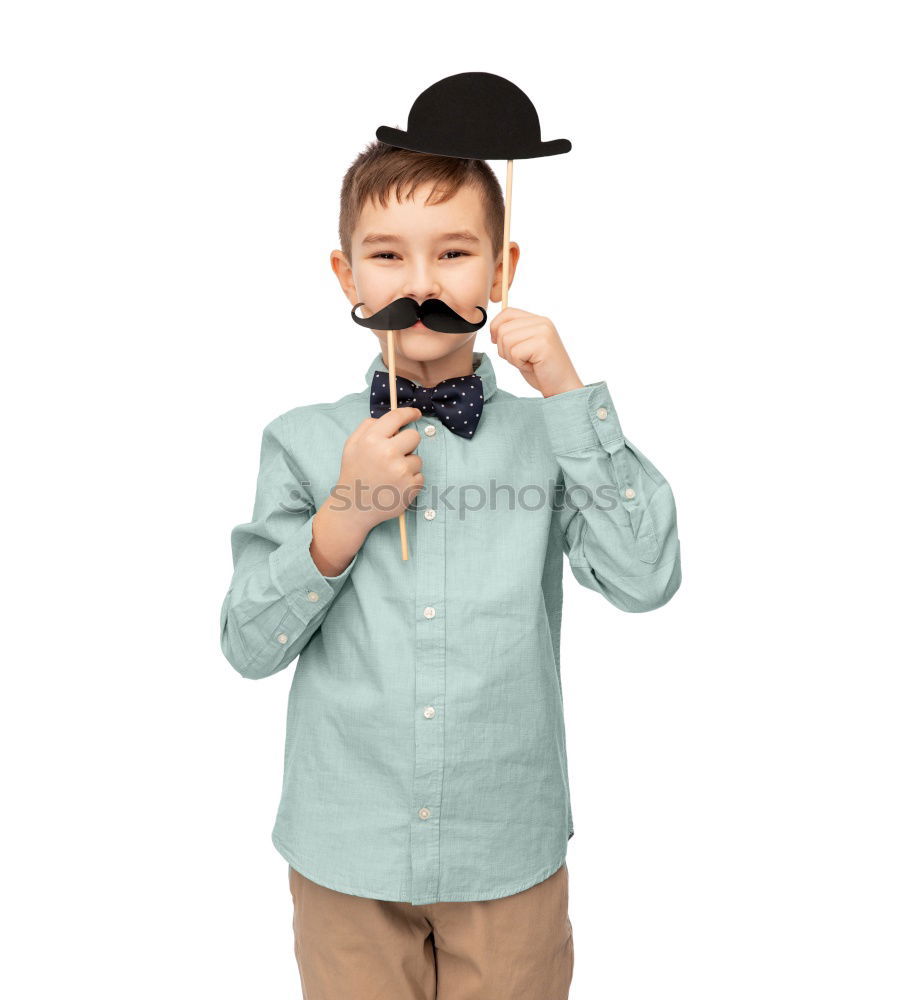 Similar – Funny boy with fake mustache and tie