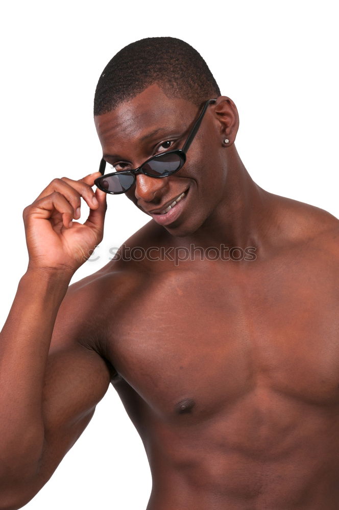 Similar – Fit shirtless young black man doing stretching after running