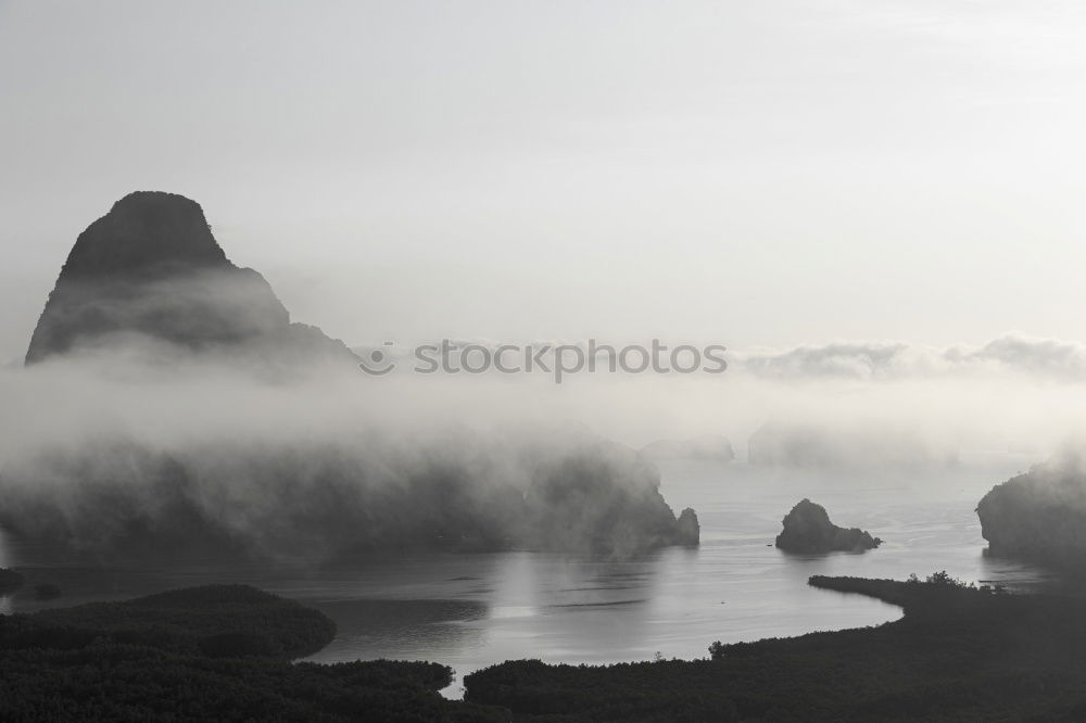 Similar – Foto Bild Berg- und Seenlandschaft im Morgennebel