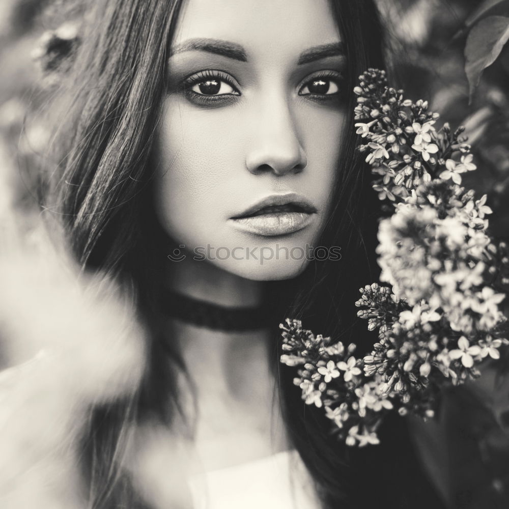 Similar – Image, Stock Photo Pretty woman standing with white flowers