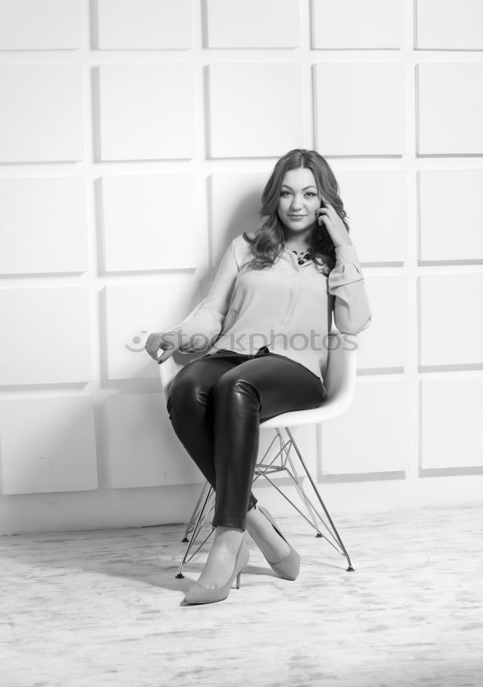 Woman on stool in studio