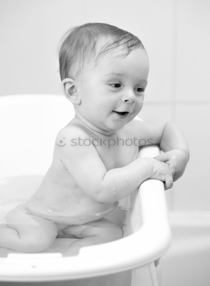 Similar – Image, Stock Photo Little baby taking shower