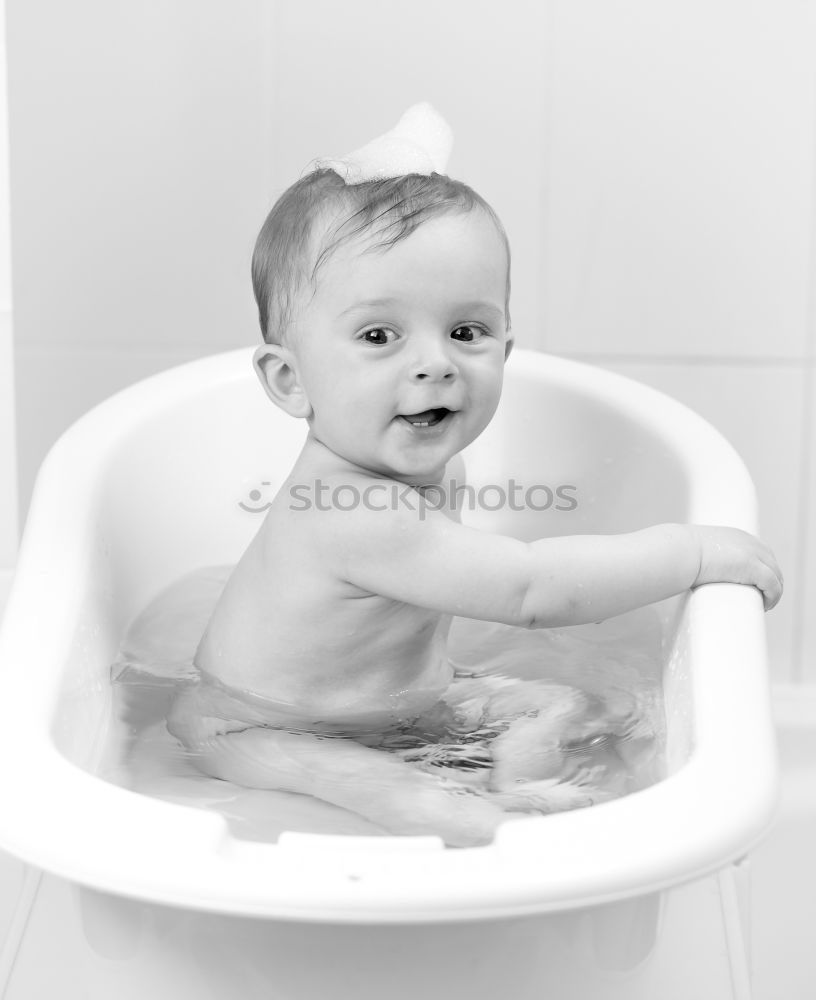 Similar – Image, Stock Photo Little baby taking shower