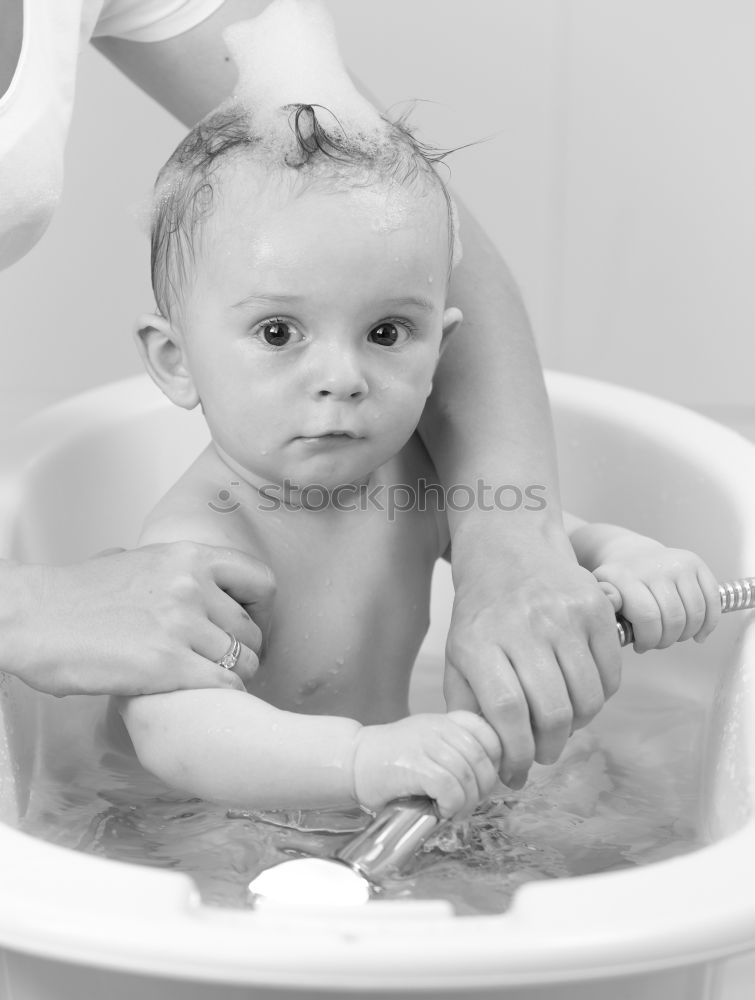 Similar – Image, Stock Photo Little baby taking shower