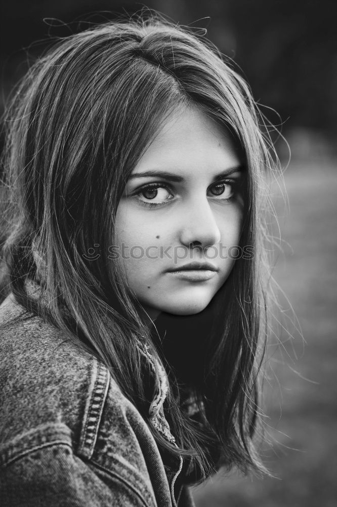 Similar – Portrait of a beautiful girl with big blue eyes looking at camera with surprised expression