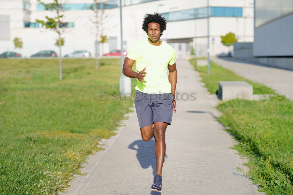 Similar – Rear view of black man running in urban background.