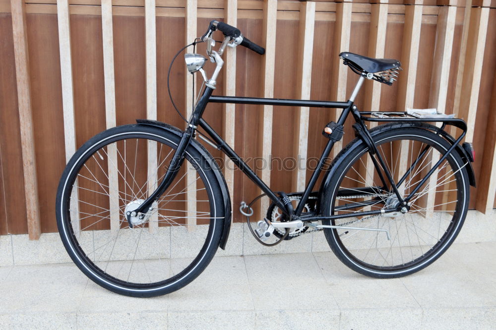 Similar – Image, Stock Photo Old ladies bike in summer in front of a green hedge on grey compound pavement in Oerlinghausen near Bielefeld in the Teutoburg Forest in East Westphalia-Lippe