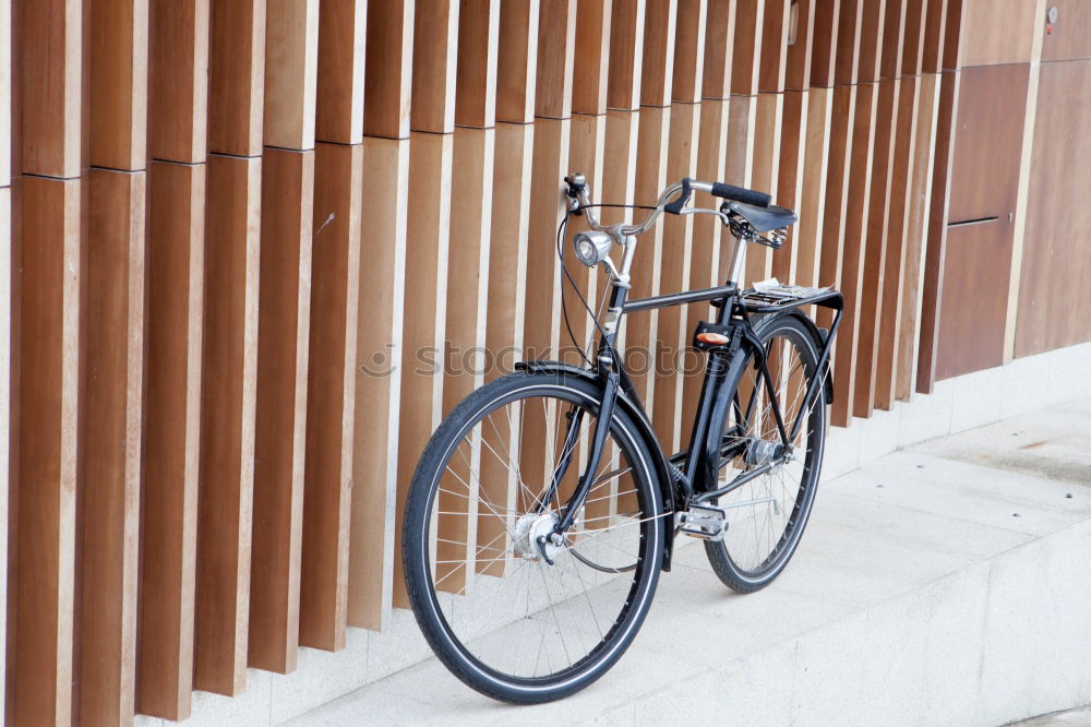 Similar – Road bicycle against brick wall