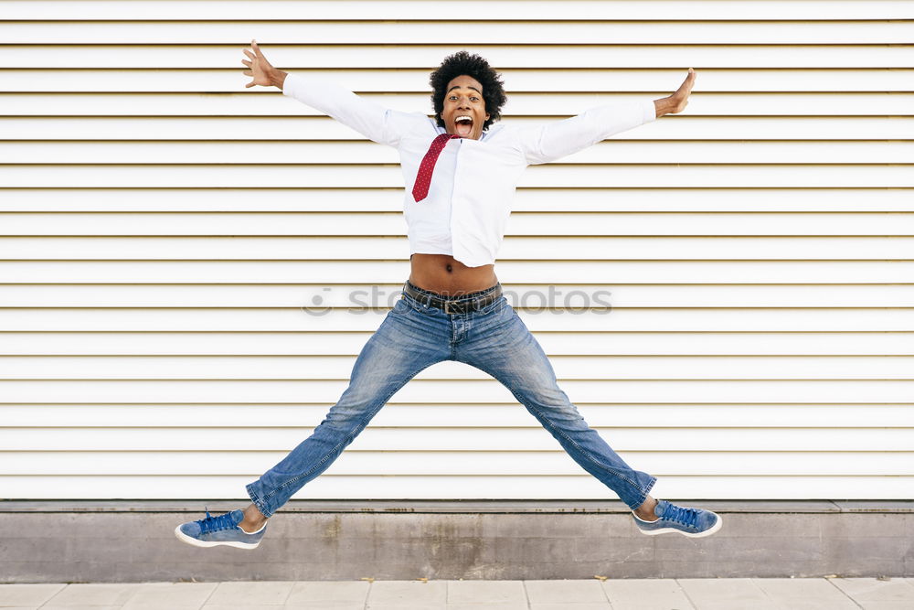 Image, Stock Photo Young beautiful Afro-American woman posing and smiling while standing against brick wall