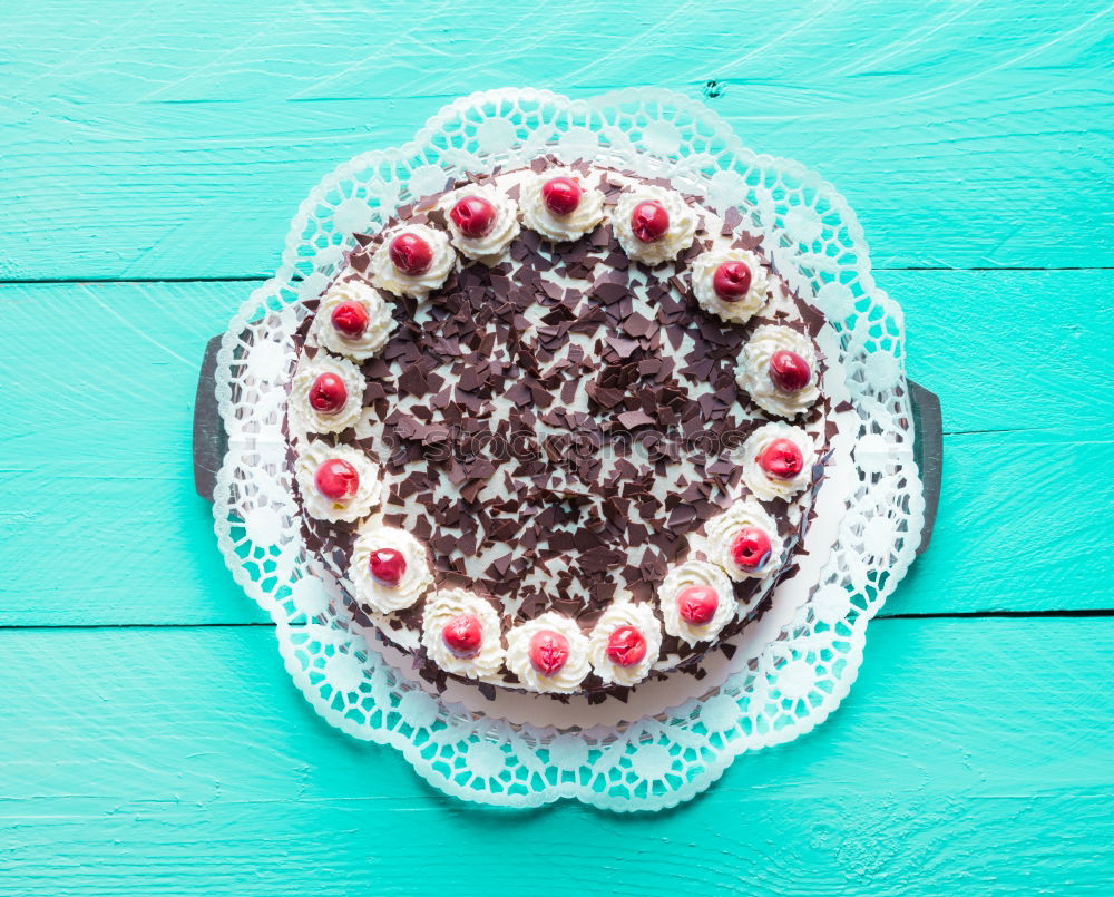 Similar – Image, Stock Photo Black Forest cherry cake on white wood