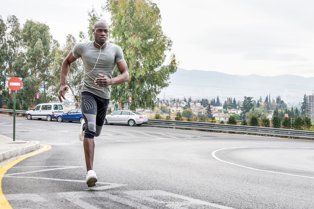 Image, Stock Photo Black man running outdoors in urban road