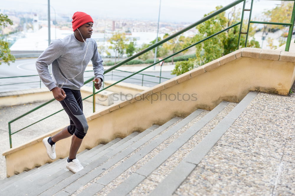Similar – Image, Stock Photo Black man running upstairs outdoors