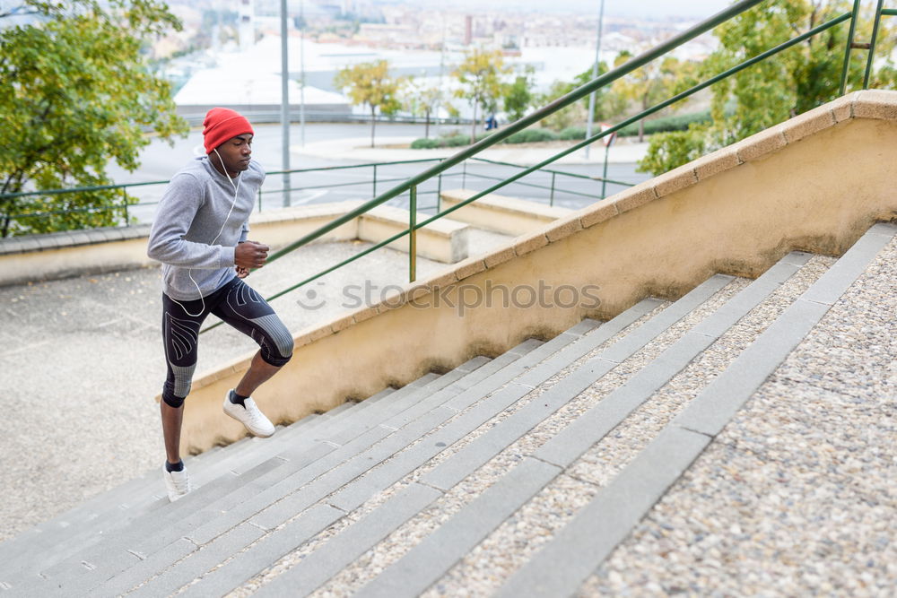 Image, Stock Photo Black man running upstairs outdoors