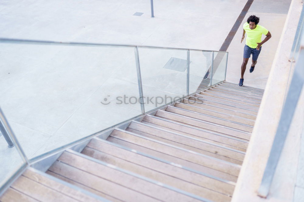 Similar – Two sportsmen running up stairs