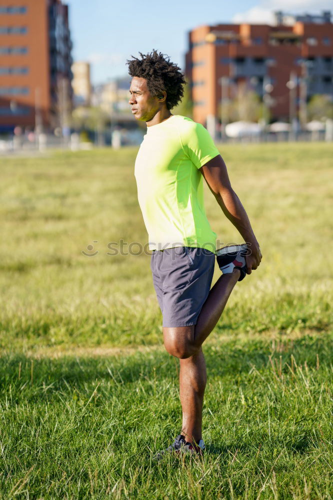 Similar – Image, Stock Photo Fit shirtless young black man doing legs stretching