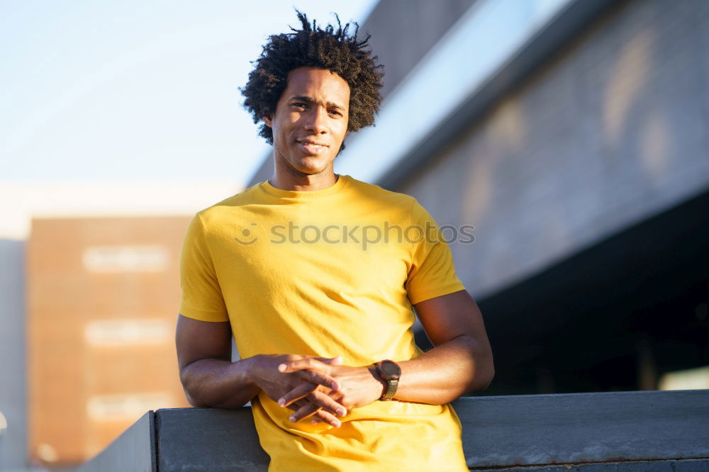 Similar – Afro young man using mobile phone and fixed gear bicycle.