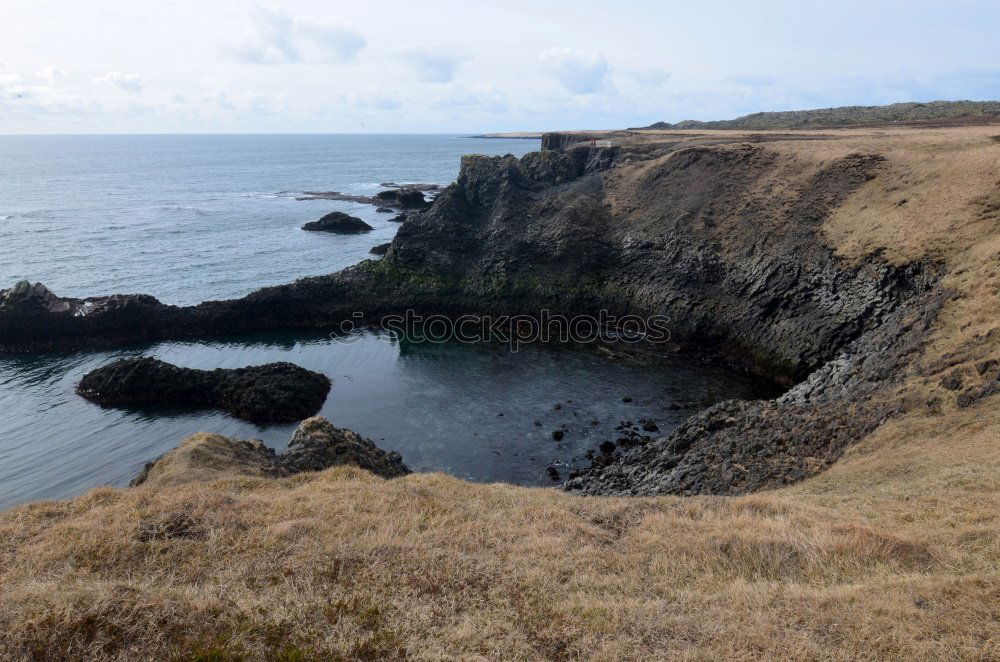 Similar – Coastal hills in dry grass