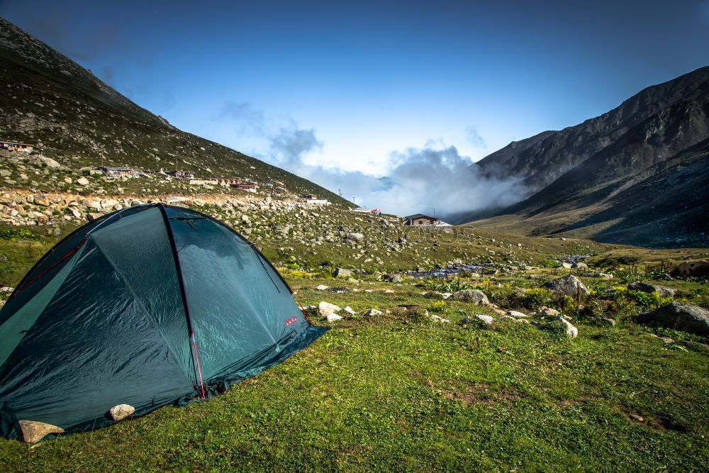 Similar – Image, Stock Photo Green tent on the green lawn in snow mountains