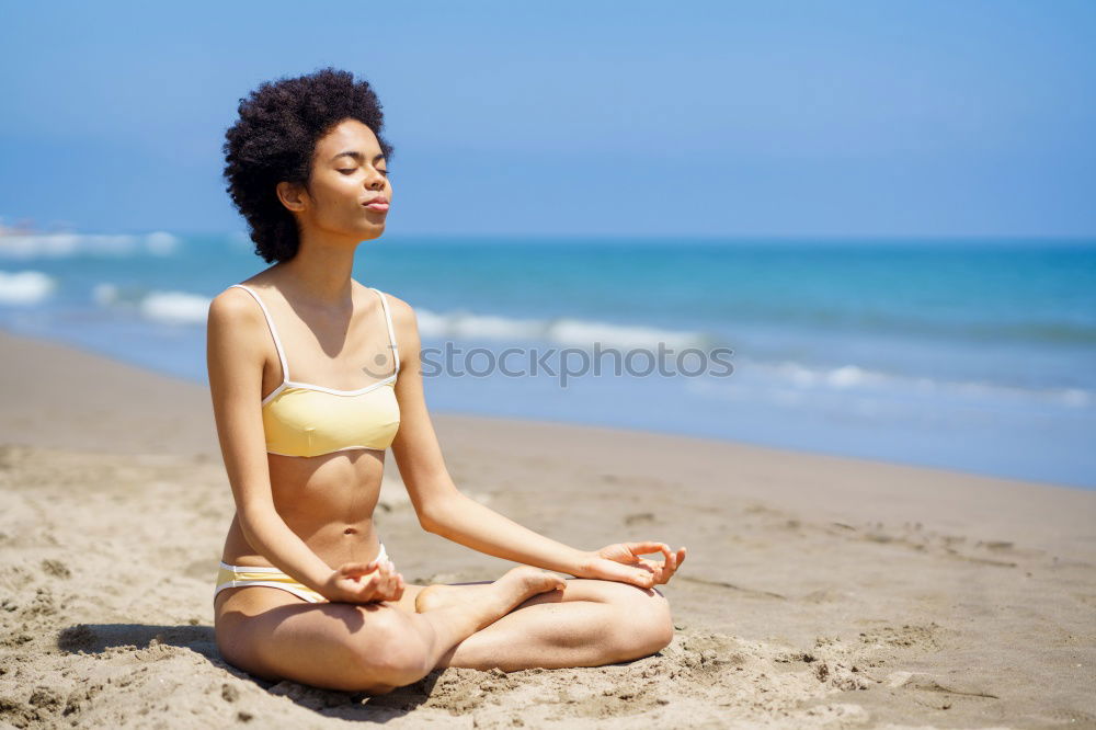 Similar – Image, Stock Photo Black woman, afro hairstyle, doing yoga in the beach