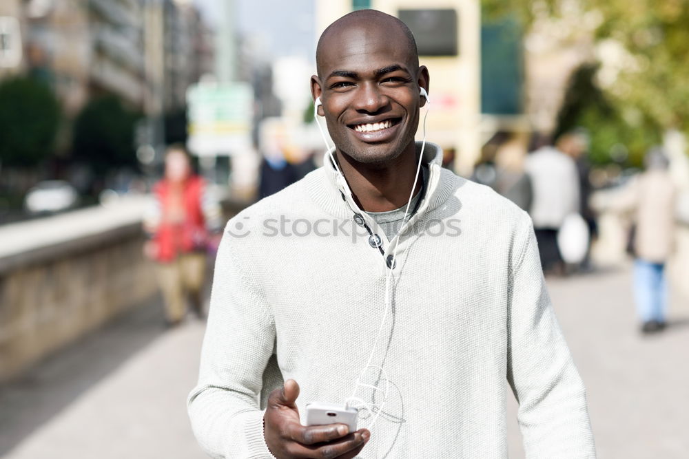 Similar – Young black man drinking water before running outdoors