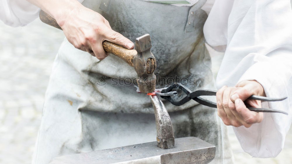 Similar – Image, Stock Photo Old hammer and anvil in a forge