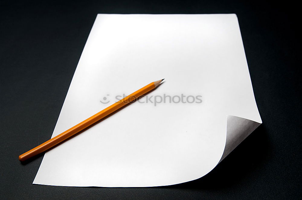 Similar – Foto Bild Schreib mal wieder! Ein leeres Blatt Papier mit Stift auf einem rustikalen Holztisch, daneben ein zerknüllter beschriebener Brief