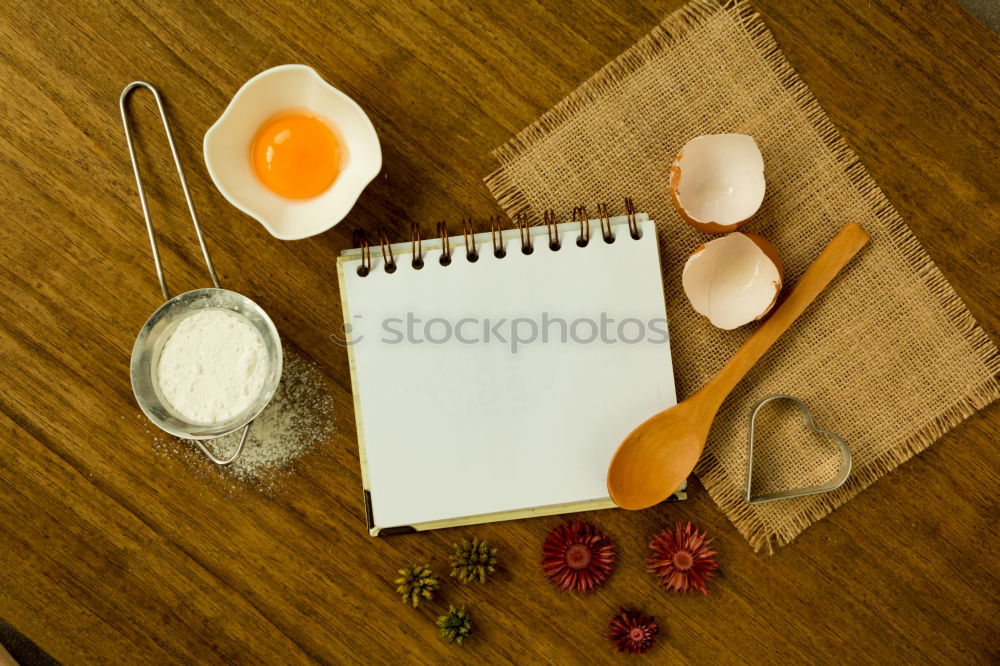 Similar – Image, Stock Photo Tea- Time: a tea cup with tea bag, sugar and cookies on a wooden table