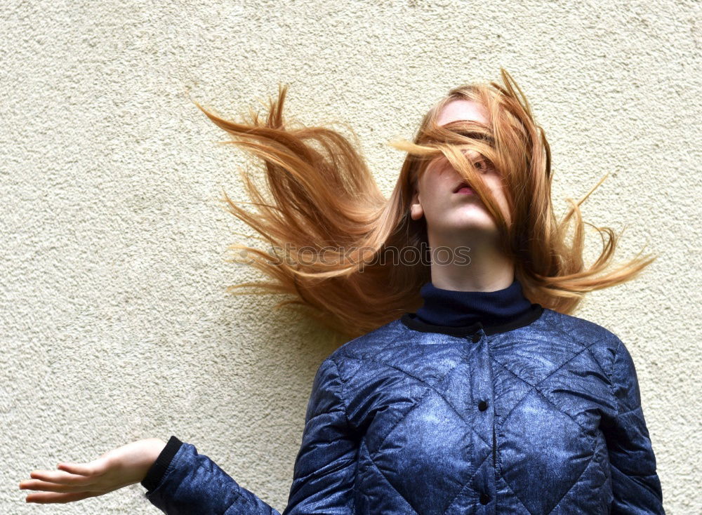 Similar – Woman with blown away hair