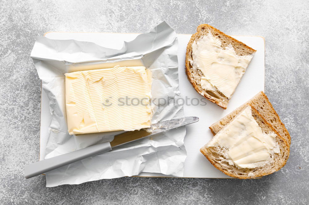 Similar – Image, Stock Photo Hummus in bowl and pita bread on white wooden table.