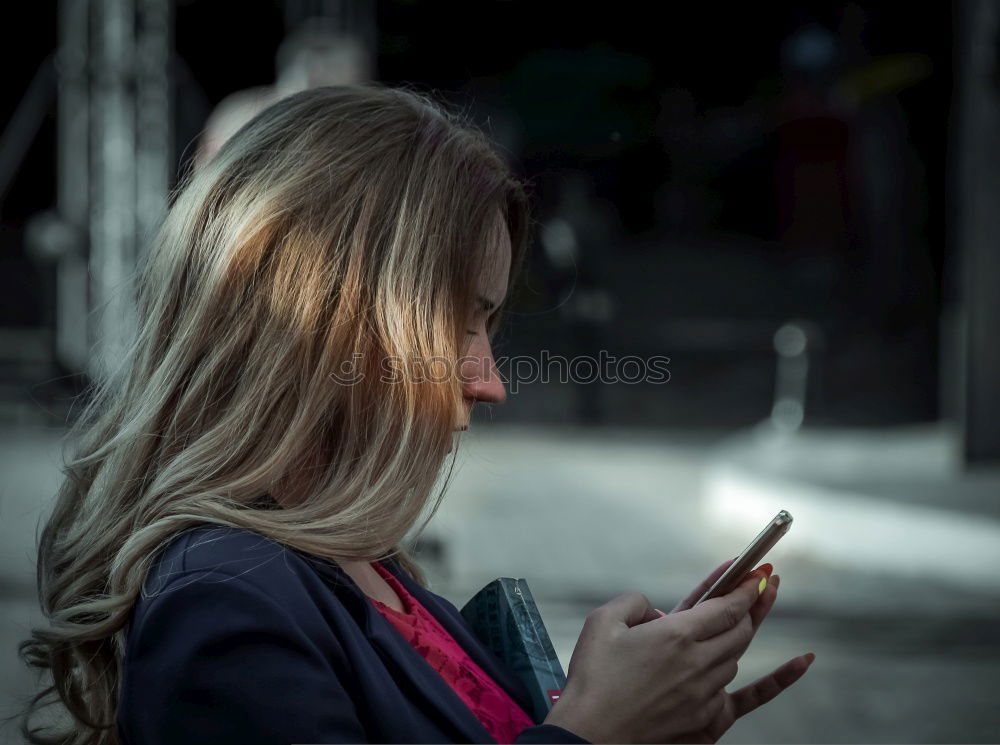 Image, Stock Photo Woman with grey dyed hair using her phone