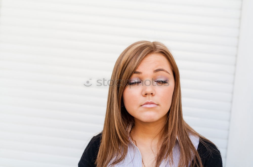 Similar – A blonde young woman in a sunny day thinking and feeling with closed eyes