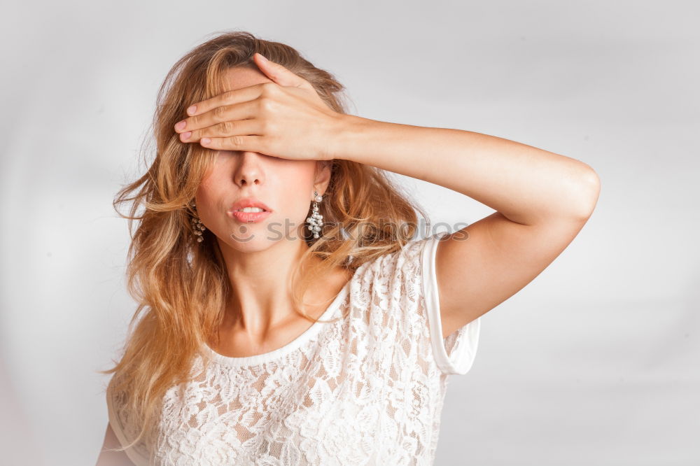 Similar – A blonde young woman in a sunny day thinking and feeling with closed eyes