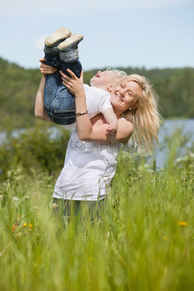 Similar – Image, Stock Photo Young woman holding hand of man and leading by a meadow