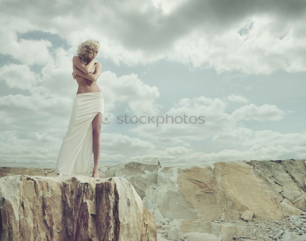 Similar – Image, Stock Photo Young couple embracing outdoors under blanket in a cold day